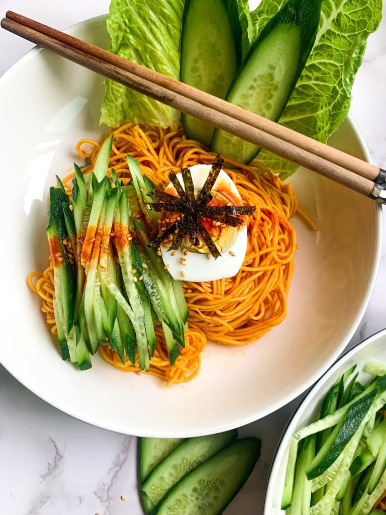bibim guksu korean spicy cold noodles with cucumber and boiled egg