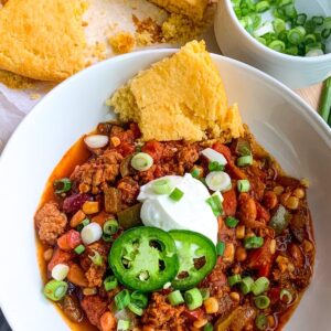 30 minute spicy turkey chili with beans corn and peppers.
