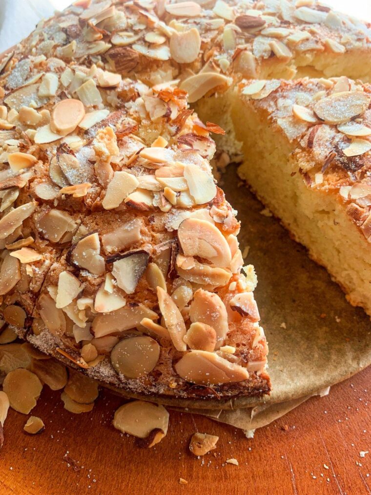 round almond cake with vanilla sponge cake